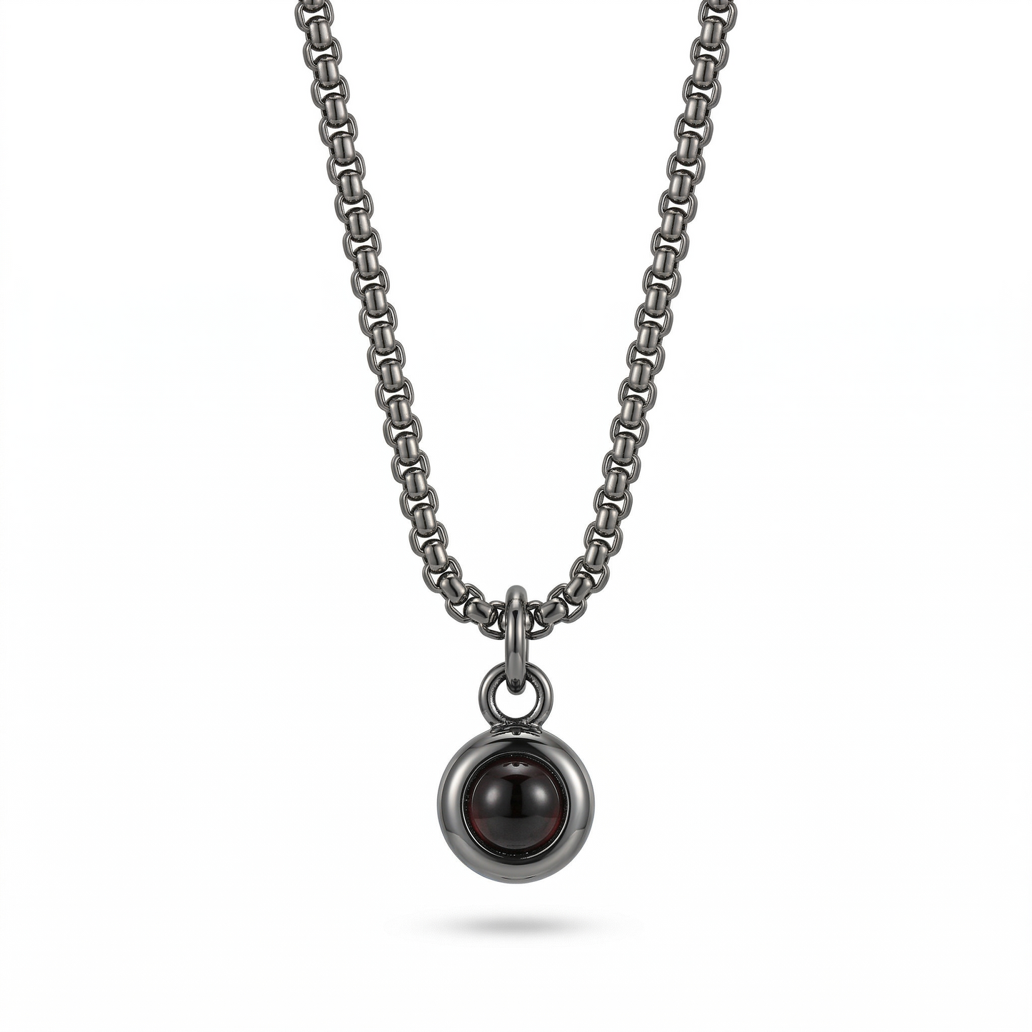 Silver necklace with a pendant on a white background
