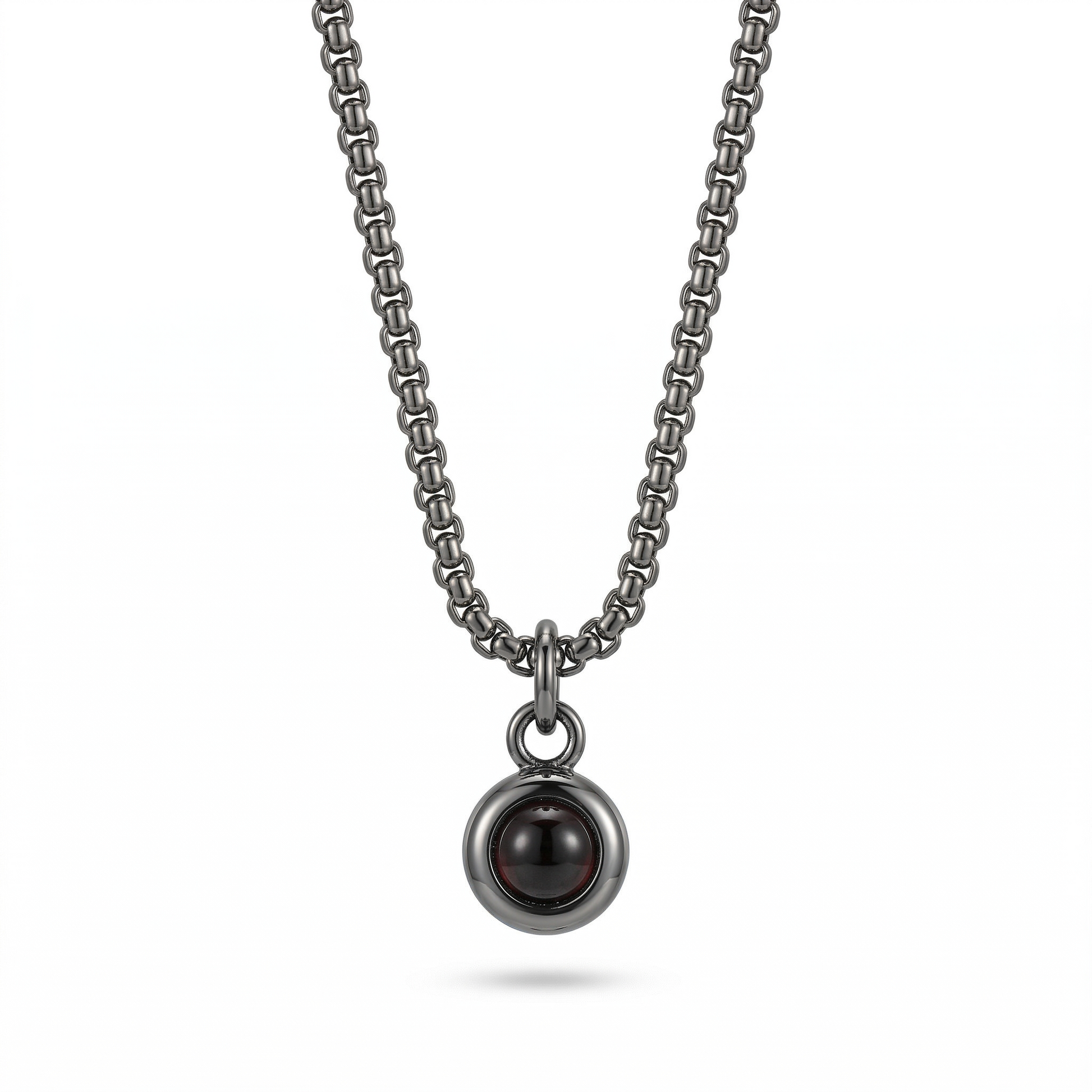 Silver necklace with a pendant on a white background